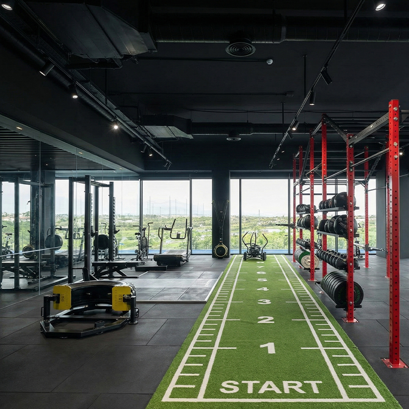 Premium cross-training studio at Eliteness featuring functional fitness zones, strength equipment, and an elevated training layout.