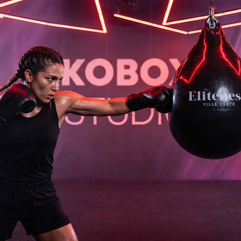 Premium KOBOX studio at Eliteness featuring cardio-boxing training in an immersive, high-energy environment